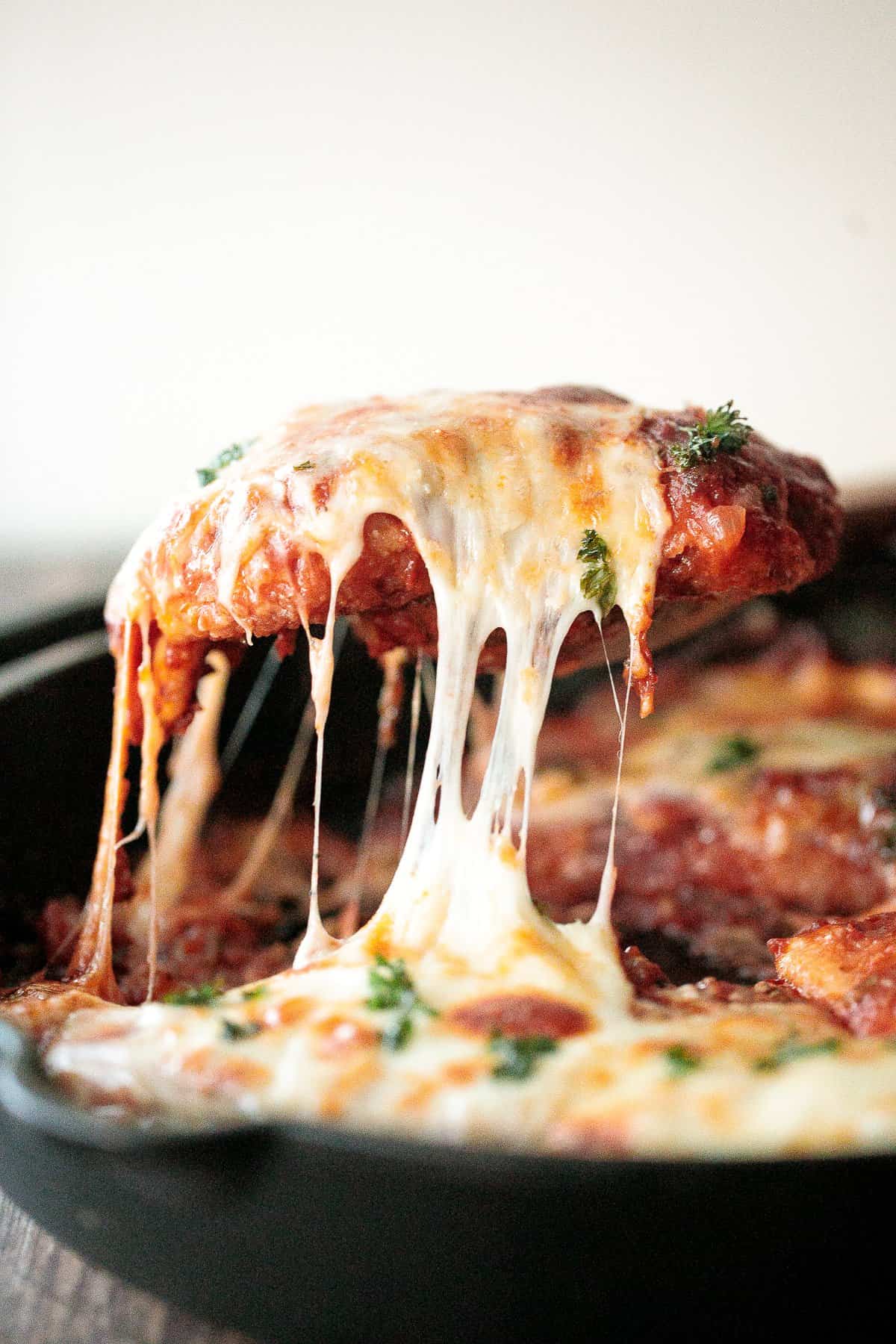 Easy chicken parmesan (parmigiana) with crispy breaded chicken, tomato sauce, and melted mozzarella and parmesan cheese. The best comfort chicken dinner. | aheadofthyme.com