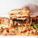 Classic easy meat lasagna is the ultimate Italian comfort food with layers of tender lasagna, meaty tomato sauce, cheese filling and melted cheese on top. | aheadofthyme.com