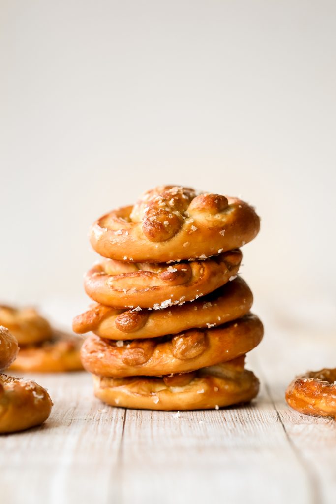 The best quick and easy salted soft pretzels are buttery, salty, and so delicious. They are golden brown and chewy on the outside, yet warm and soft inside. | aheadofthyme.com