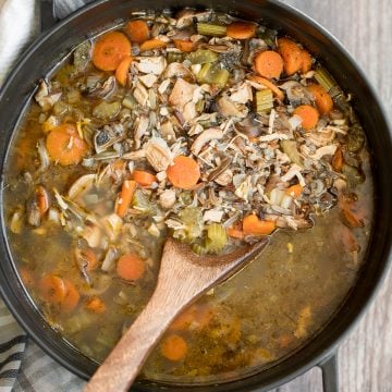 Wholesome hearty one pot leftover turkey wild rice soup is the most comforting way to use leftover turkey from Thanksgiving turkey dinner. So easy to make. | aheadofthyme.com
