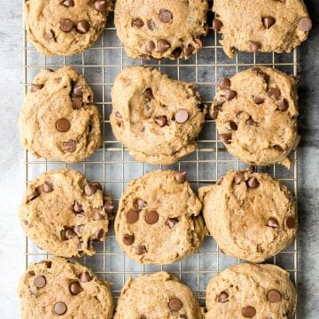 Thick, fluffy, chewy pumpkin chocolate chip cookies is when pumpkin bread meets chocolate chip cookies. These no chill cookies are ready in under 20 mins. | aheadofthyme.com