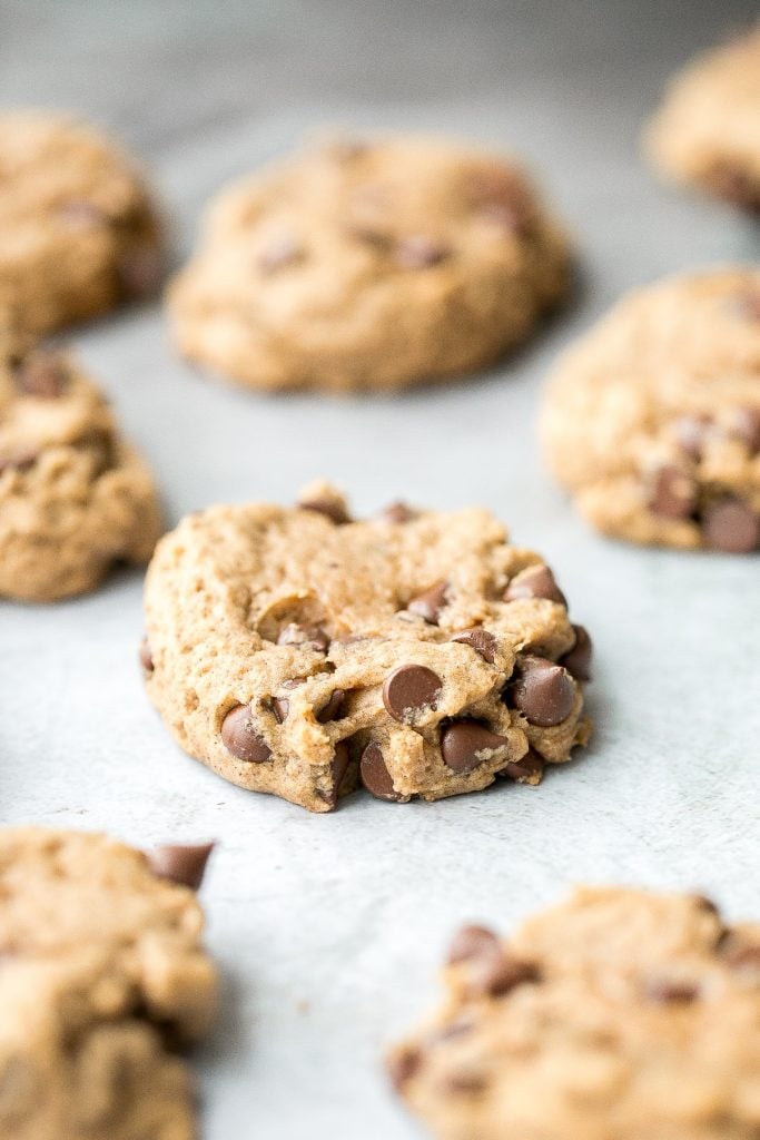 Thick, fluffy, chewy pumpkin chocolate chip cookies is when pumpkin bread meets chocolate chip cookies. These no chill cookies are ready in under 20 mins. | aheadofthyme.com