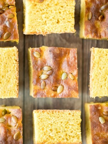 Delicious, easy pumpkin focaccia bread with fresh herbs is soft, fluffy, and springy, yet so crispy on the outside. Just 15 minutes of actual prep required. | aheadofthyme.com
