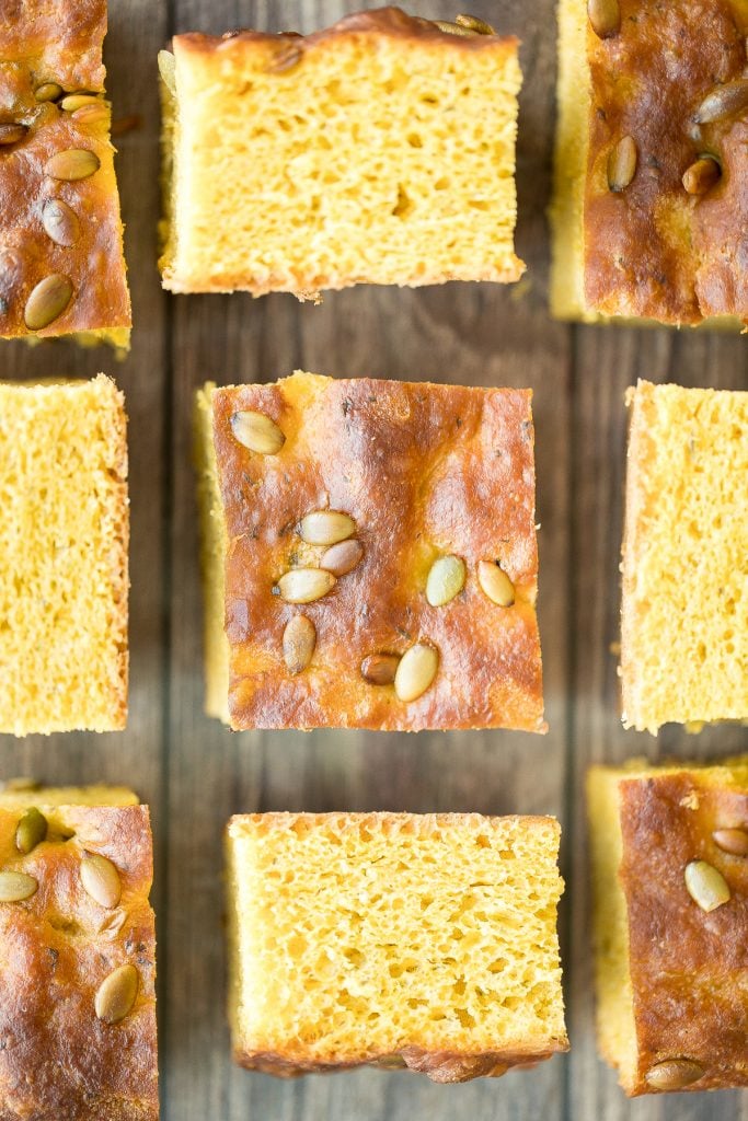 Delicious, easy pumpkin focaccia bread with fresh herbs is soft, fluffy, and springy, yet so crispy on the outside. Just 15 minutes of actual prep required. | aheadofthyme.com