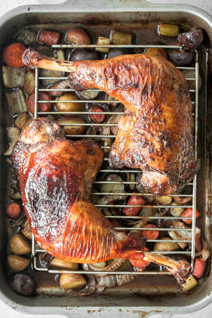 Tender, succulent and flavourful, easy roasted turkey legs with crispy skin and vegetables is a complete wholesome turkey dinner and family favourite. | aheadofthyme.com