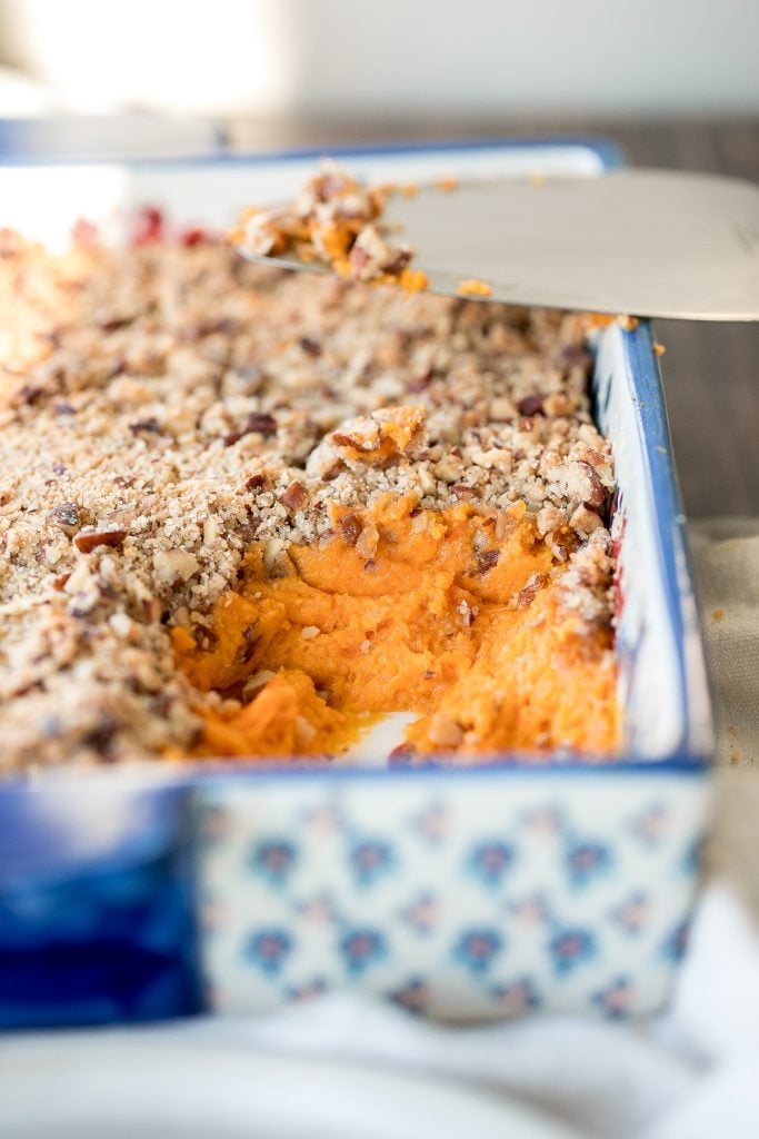 Sweet potato casserole with pecans packed with tender sweet potatoes and a buttery crunchy pecan topping is the best fall side dish for Thanksgiving dinner. | aheadofthyme.com