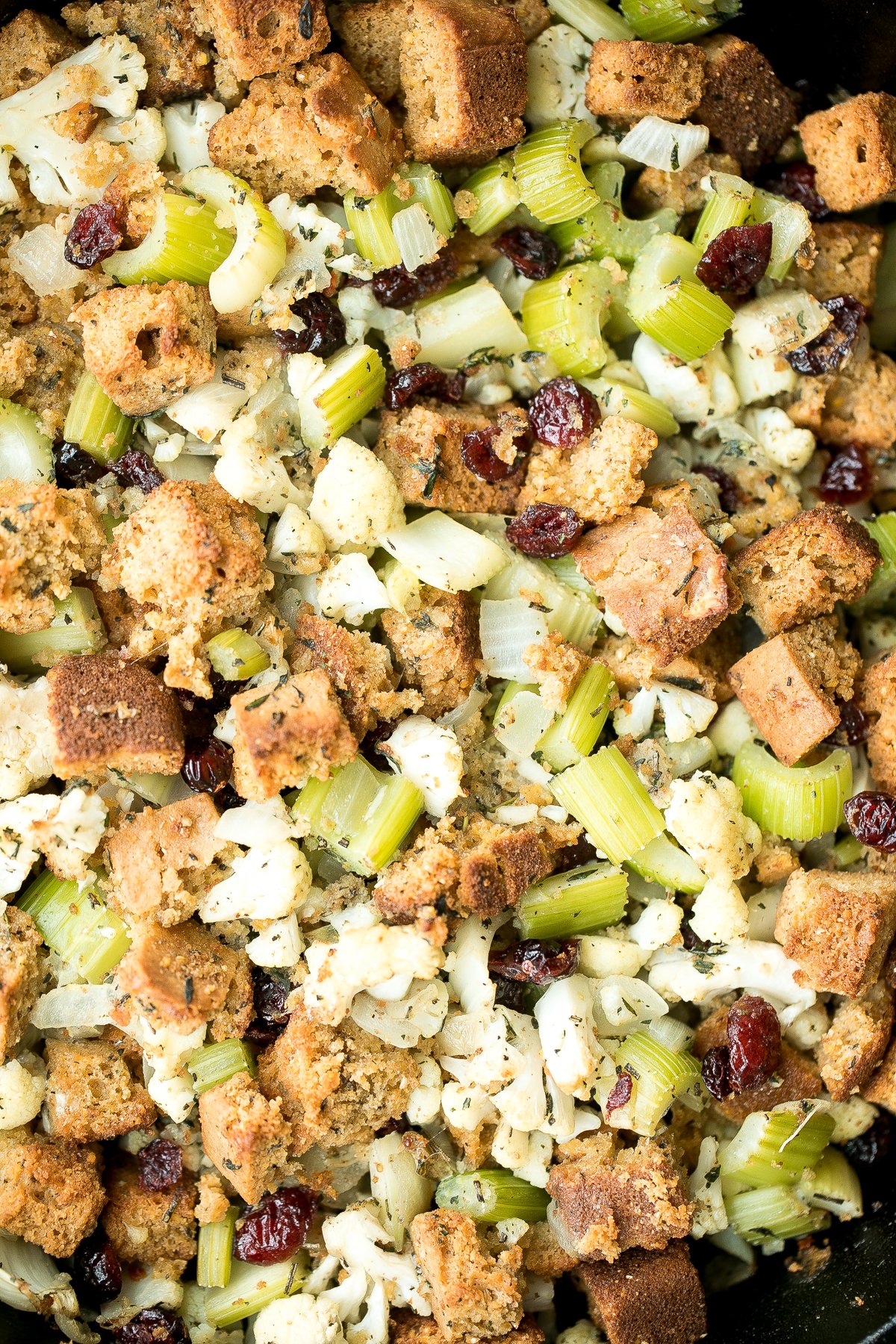 Easy vegetarian cornbread stuffing is the perfect make-ahead side dish to serve this Thanksgiving. So flavourful, moist and soft, yet crispy golden on top. | aheadofthyme.com