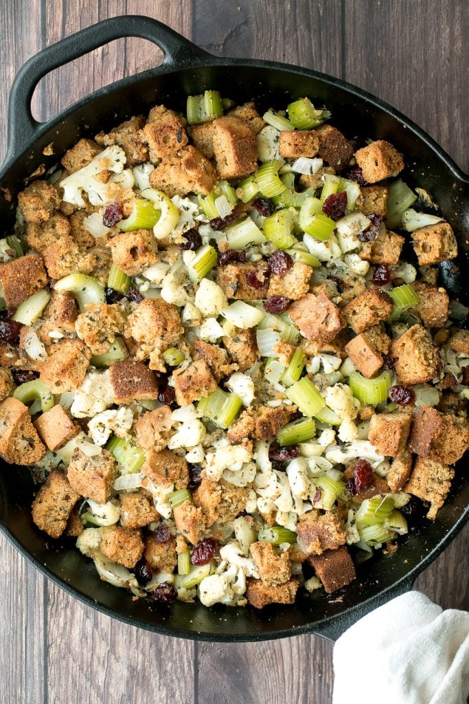 Easy vegetarian cornbread stuffing is the perfect make-ahead side dish to serve this Thanksgiving. So flavourful, moist and soft, yet crispy golden on top. | aheadofthyme.com