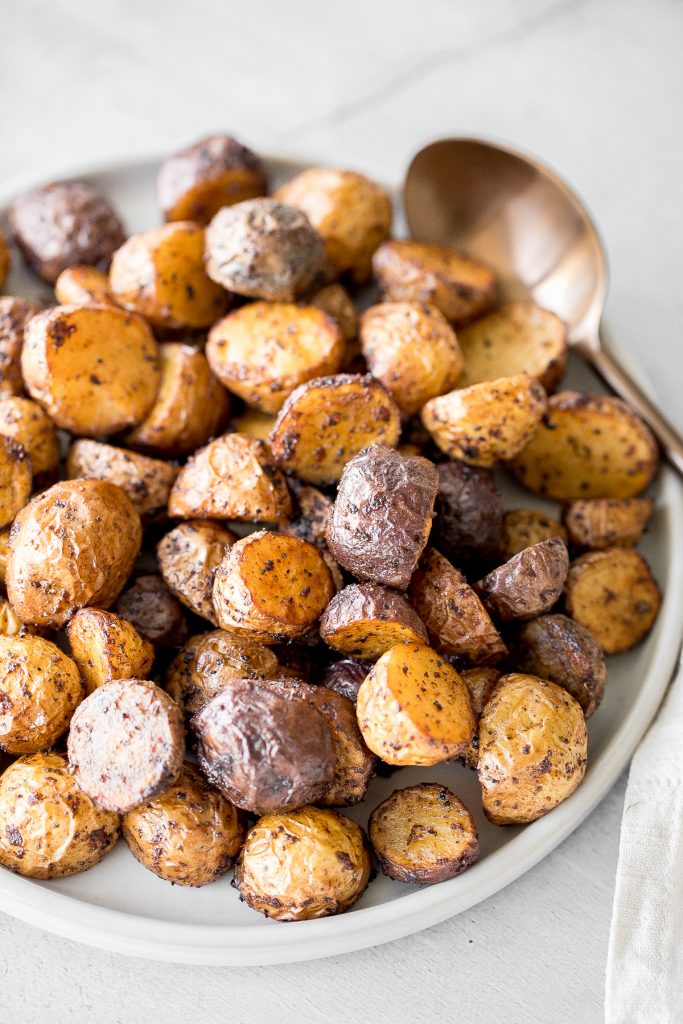 Crispy and tender, easy air fryer baby potatoes are a healthier take on a classic side dish without compromising taste or texture. Cooks in just 20 minutes. | aheadofthyme.com