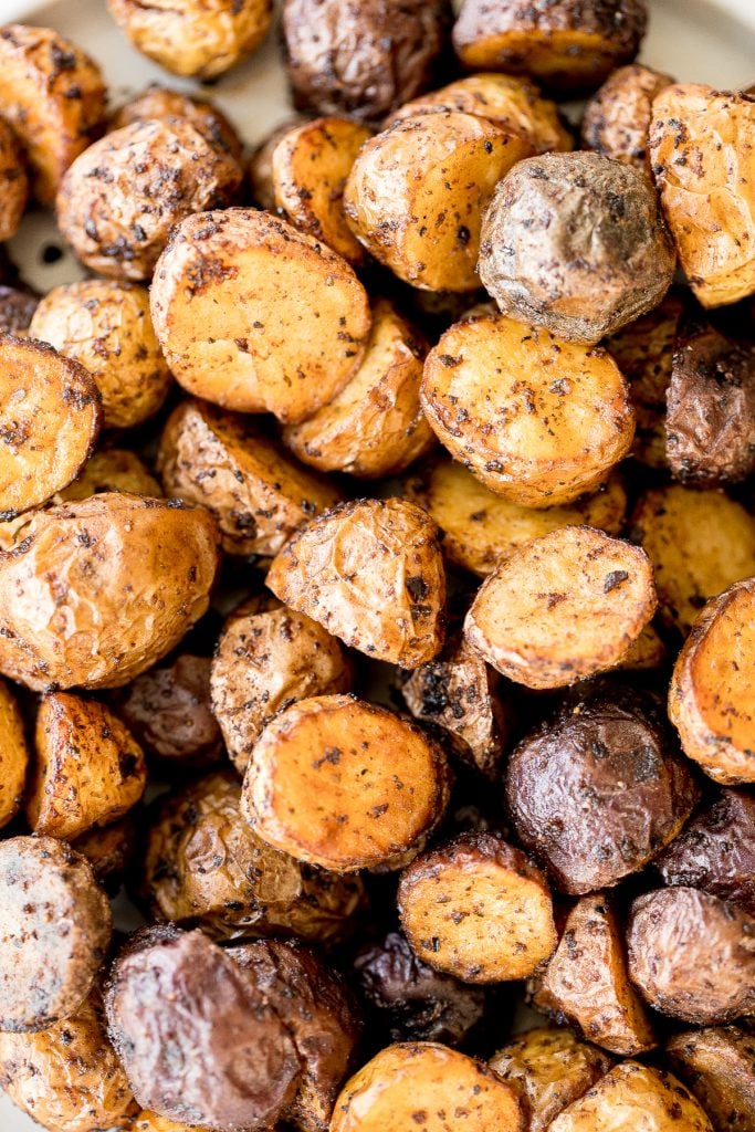 Crispy and tender, easy air fryer baby potatoes are a healthier take on a classic side dish without compromising taste or texture. Cooks in just 20 minutes. | aheadofthyme.com