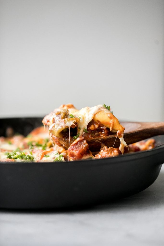 Quick and easy, cheesy tortellini and sausage bake is a delicious 30-minute dinner packed with flavour. A family-favourite comfort food for busy weeknights. | aheadofthyme.com