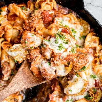 Quick and easy, cheesy tortellini and sausage bake is a delicious 30-minute dinner packed with flavour. A family-favourite comfort food for busy weeknights. | aheadofthyme.com