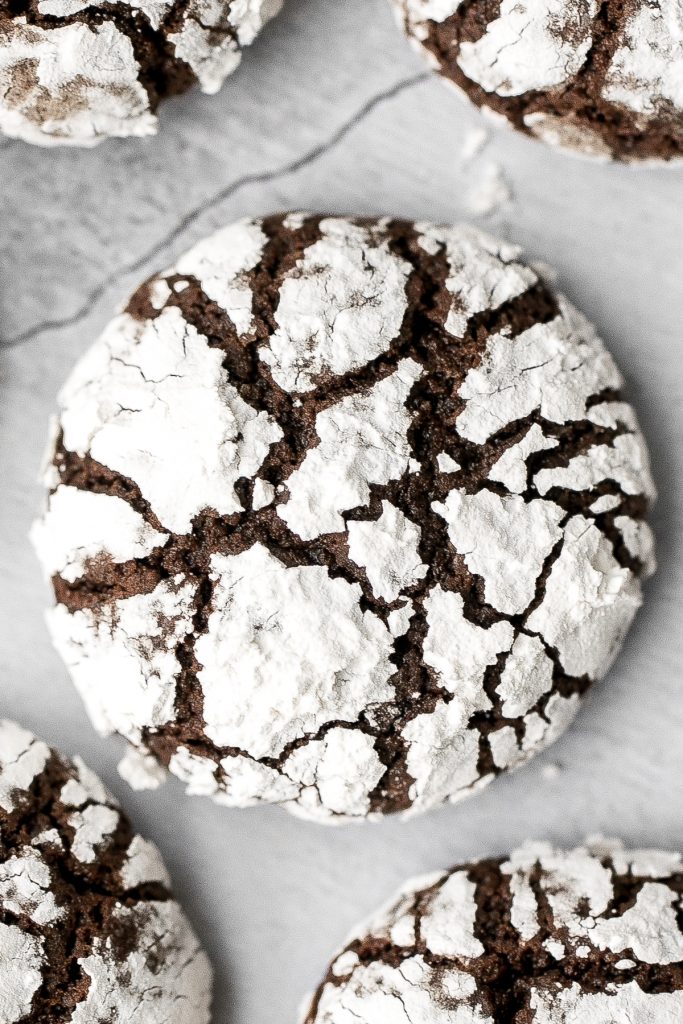 Soft tender chewy chocolate crinkle cookies are a classic Christmas cookie that tastes like a rich fudgy brownie with a crackly crust and coated in sugar. | aheadofthyme.com