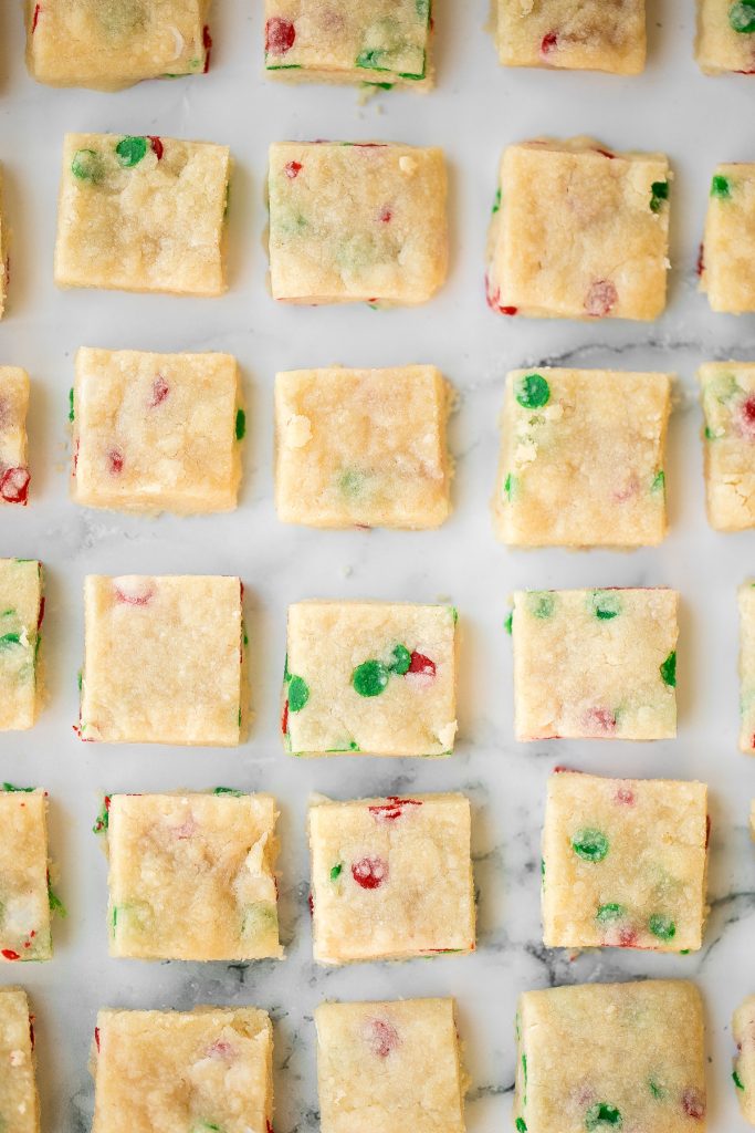 Funfetti Christmas shortbread cookie bites are little bites of buttery melt-in-your-mouth shortbread packed with festive sprinkles for a fun holiday treat. | aheadofthyme.com