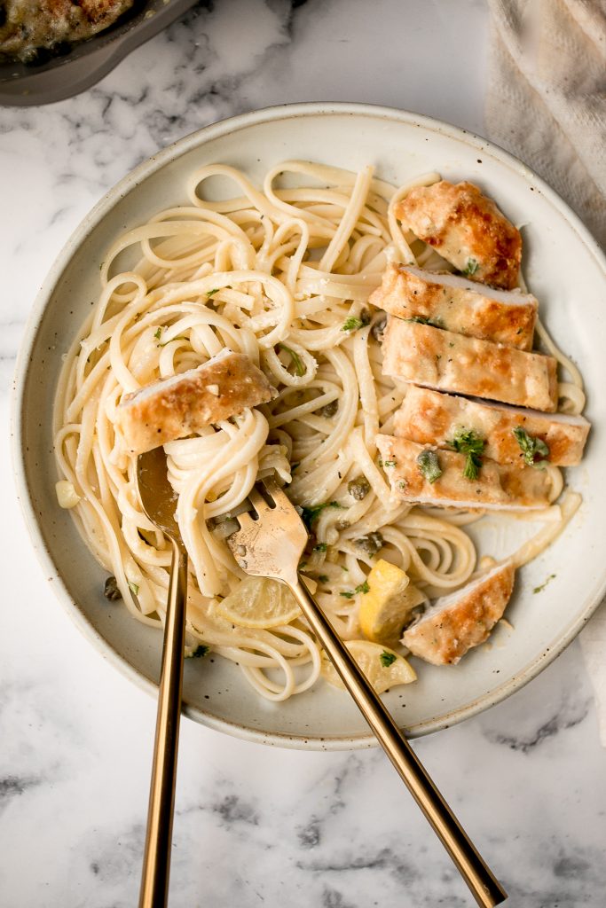 Quick and easy, creamy lemon chicken piccata is a simple and delicious 30-minute meal made with tender chicken breast in a light lemon sauce with capers. | aheadofthyme.com