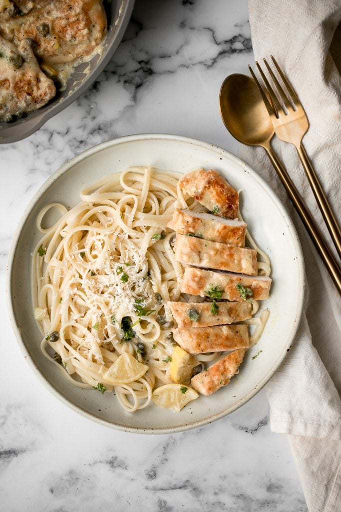 Quick and easy, creamy lemon chicken piccata is a simple and delicious 30-minute meal made with tender chicken breast in a light lemon sauce with capers. | aheadofthyme.com