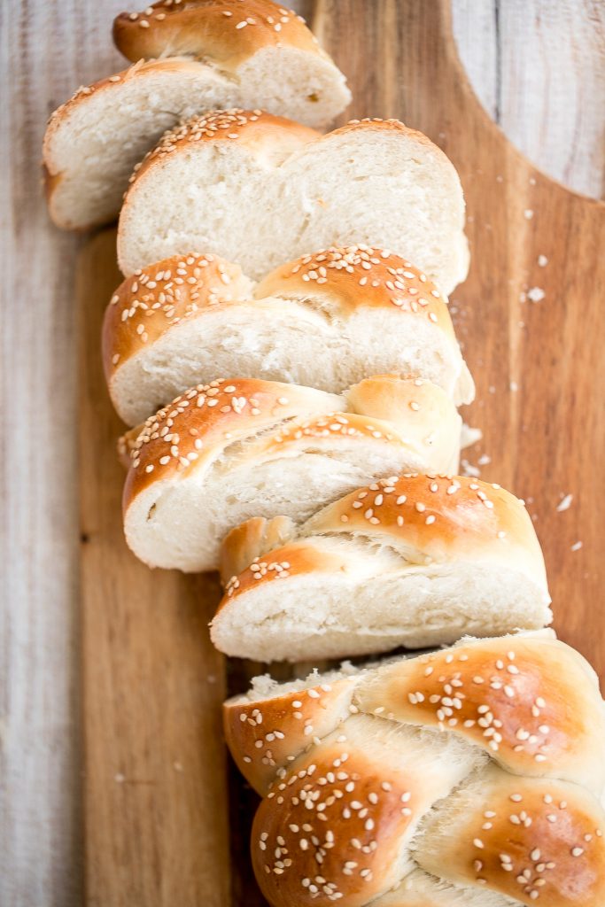 Beautiful three-strand braided loaves of easy challah bread are light, soft and fluffy, with a golden brown crust. Rich in flavour and slightly sweet. | aheadofthyme.com