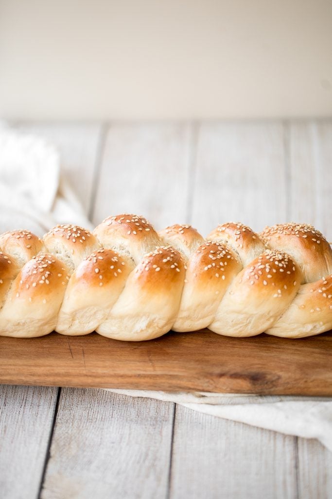 Beautiful three-strand braided loaves of easy challah bread are light, soft and fluffy, with a golden brown crust. Rich in flavour and slightly sweet. | aheadofthyme.com