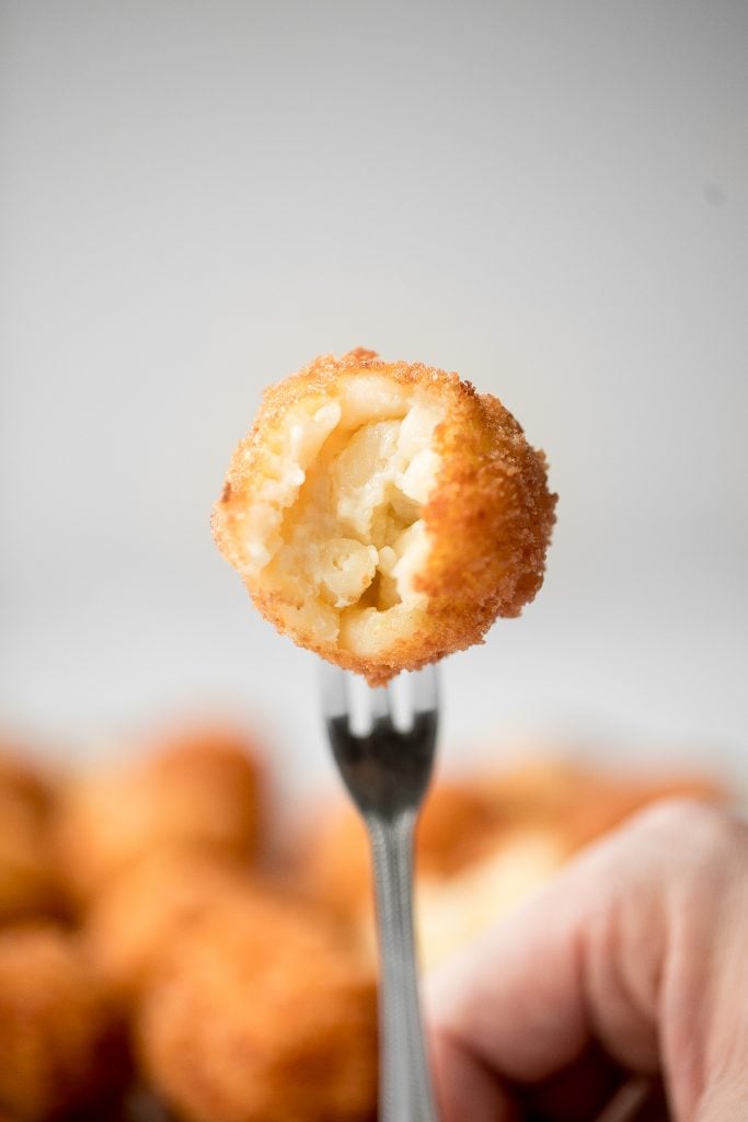 Fried mac and cheese balls are crispy on the outside, creamy and cheesy on the inside, and have the perfect crunch. Best way to use leftover mac and cheese. | aheadofthyme.com