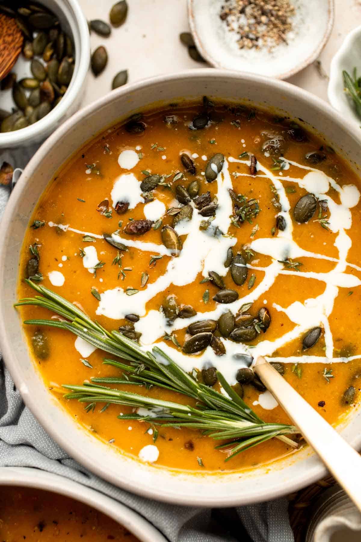 Savor the taste of fall with Roasted Butternut Squash Soup. This vegan soup is healthy, nourishing, and delicious comfort food in a bowl. | aheadofthyme.com