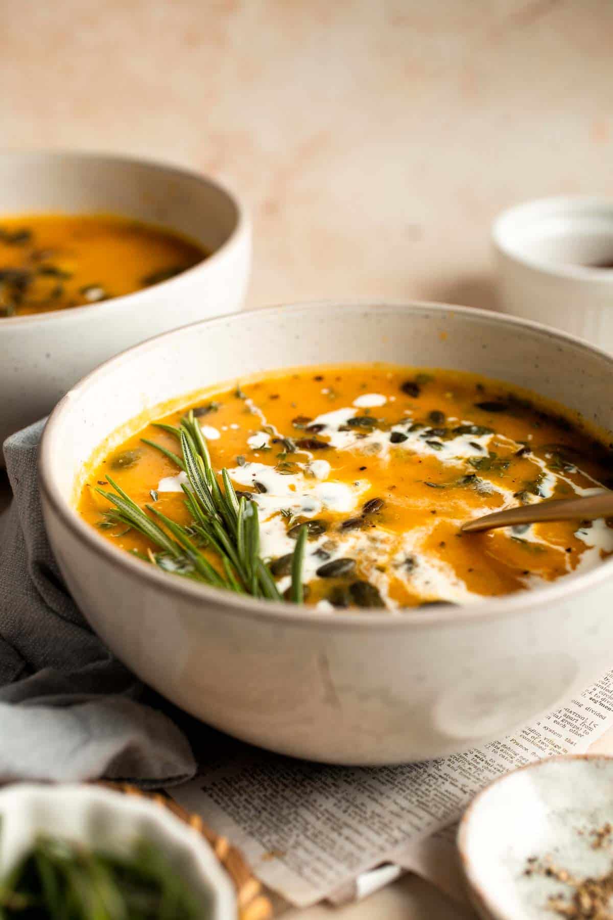 Savor the taste of fall with Roasted Butternut Squash Soup. This vegan soup is healthy, nourishing, and delicious comfort food in a bowl. | aheadofthyme.com