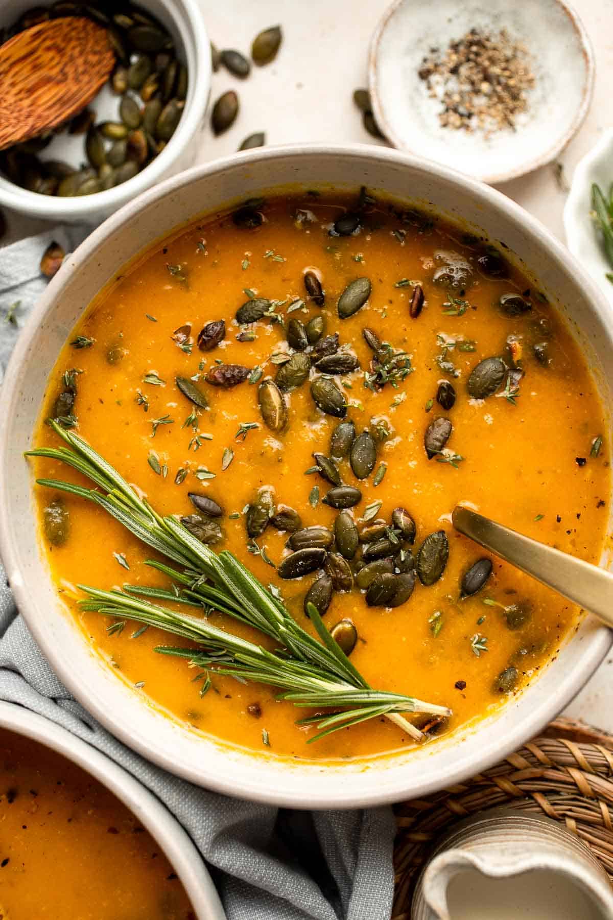 Savor the taste of fall with Roasted Butternut Squash Soup. This vegan soup is healthy, nourishing, and delicious comfort food in a bowl. | aheadofthyme.com