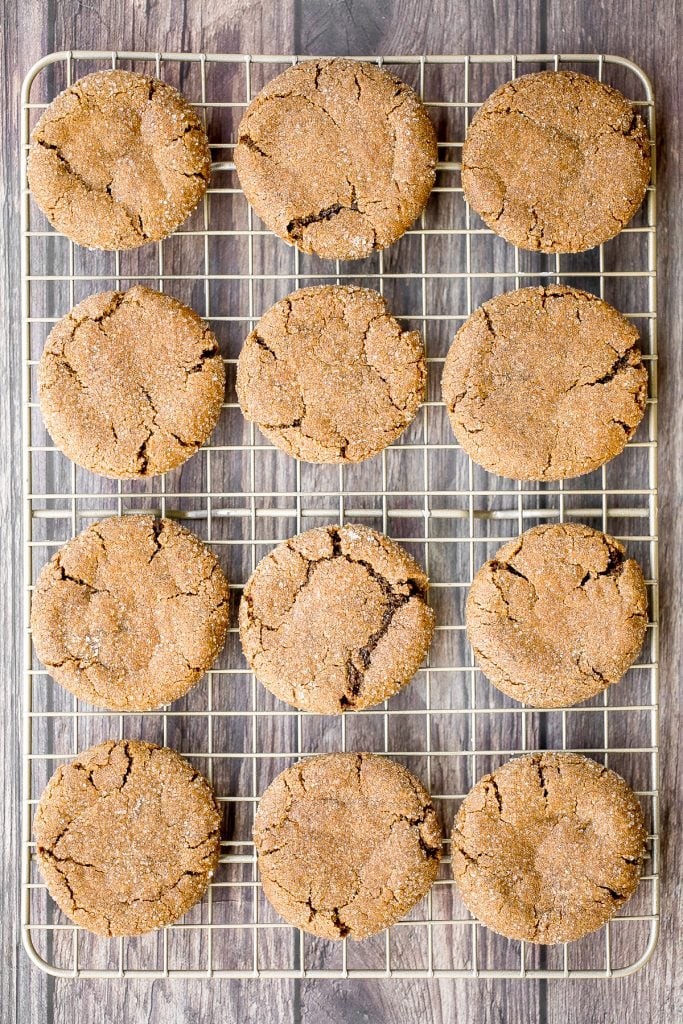 Soft chewy ginger cookies packed with ginger, molasses, and cinnamon spice is the most warm and cozy cookie ever. These holiday cookies stay soft for days. | aheadofthyme.com