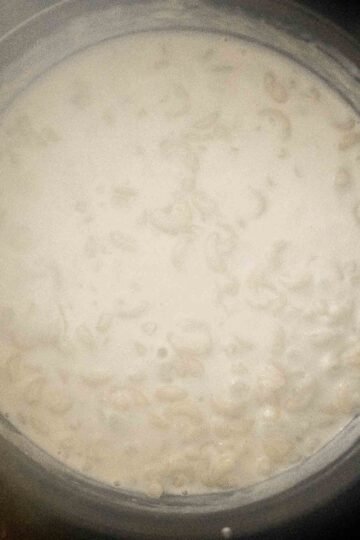 Quick and easy, creamy Stovetop Mac and Cheese with White Cheddar made in one pot and ready in 20 minutes with three cheeses for extra flavor. | aheadofthyme.com