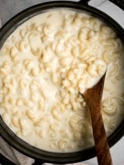 Quick and easy, creamy stovetop mac and cheese with white cheddar is a delicious and comforting one pot 20-minute meal packed with three types of cheese. | aheadofthyme.com
