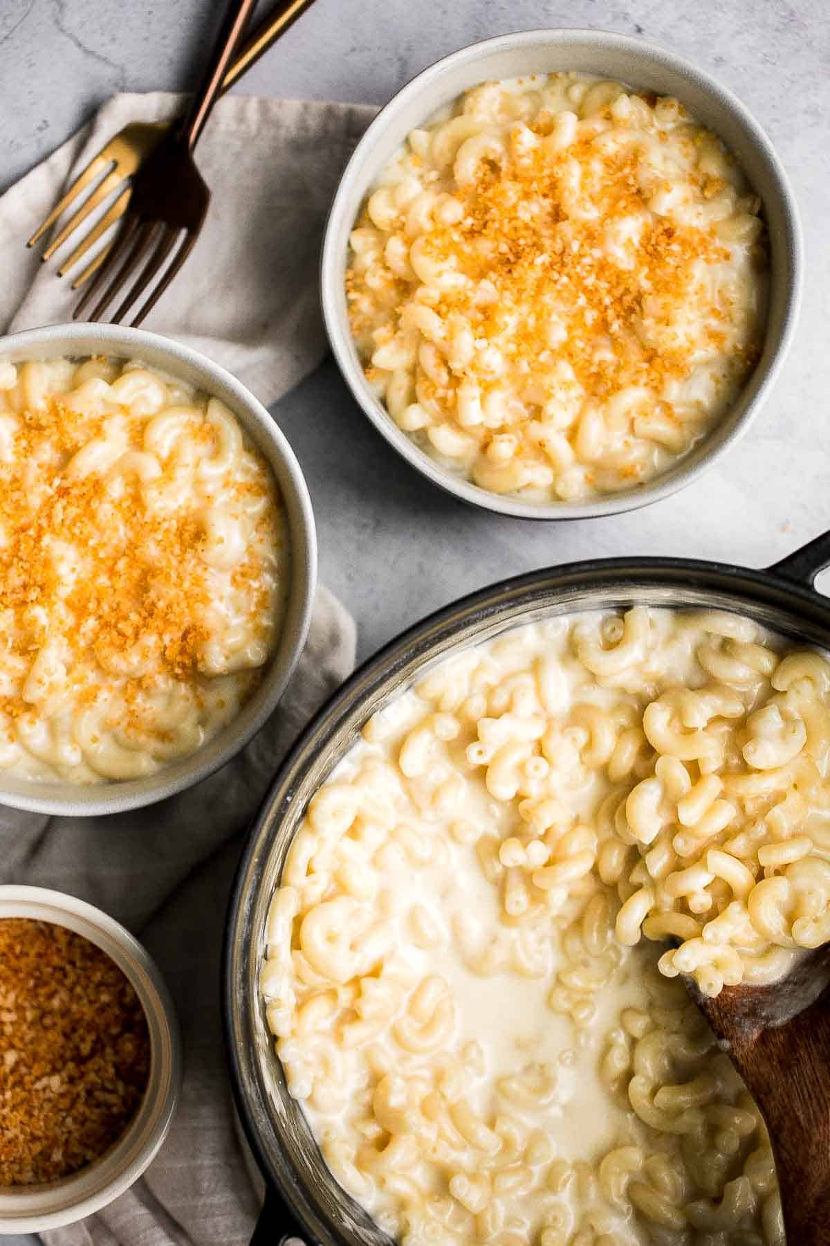Quick and easy, creamy Stovetop Mac and Cheese with White Cheddar made in one pot and ready in 20 minutes with three cheeses for extra flavor. | aheadofthyme.com