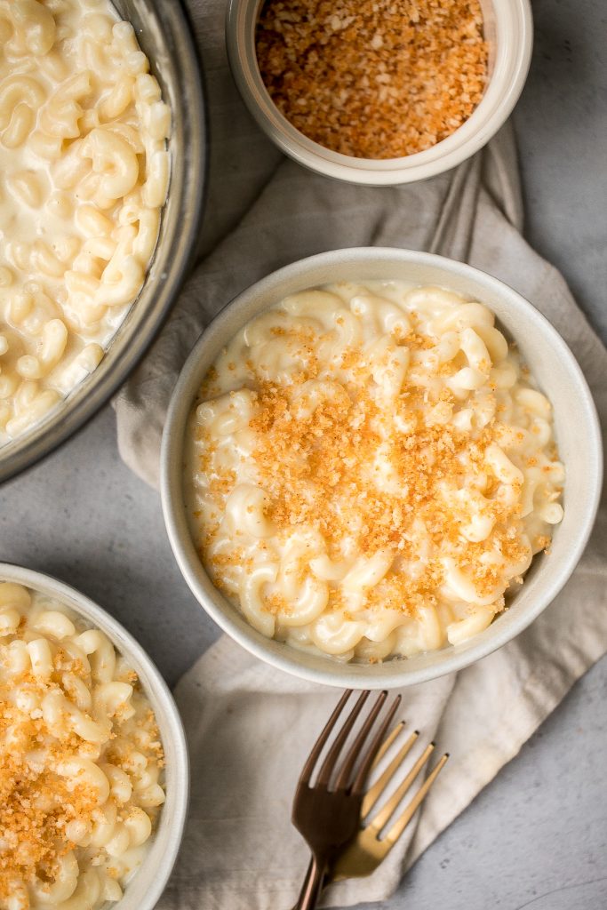 Quick and easy, creamy stovetop mac and cheese with white cheddar is a delicious and comforting one pot 20-minute meal packed with three types of cheese. | aheadofthyme.com