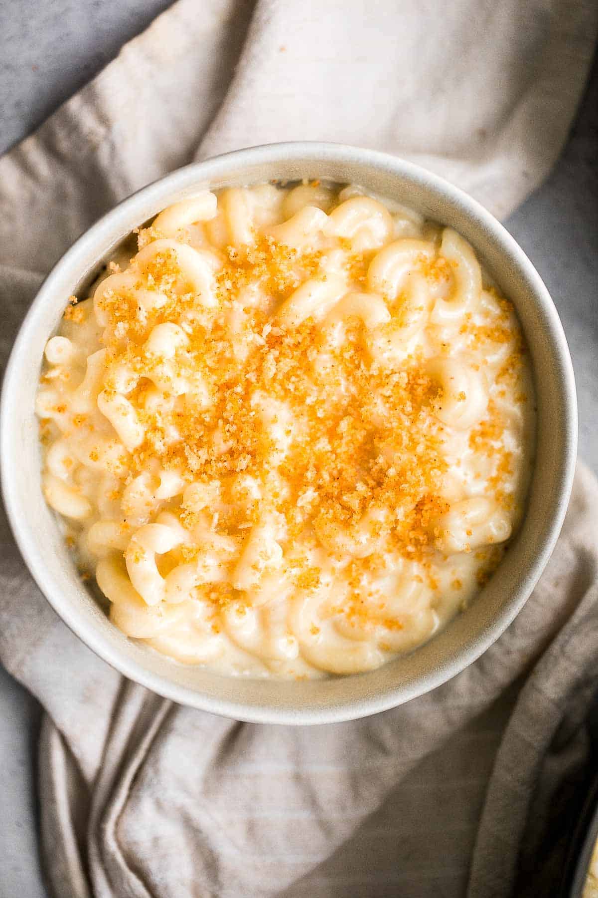 Quick and easy, creamy Stovetop Mac and Cheese with White Cheddar made in one pot and ready in 20 minutes with three cheeses for extra flavor. | aheadofthyme.com