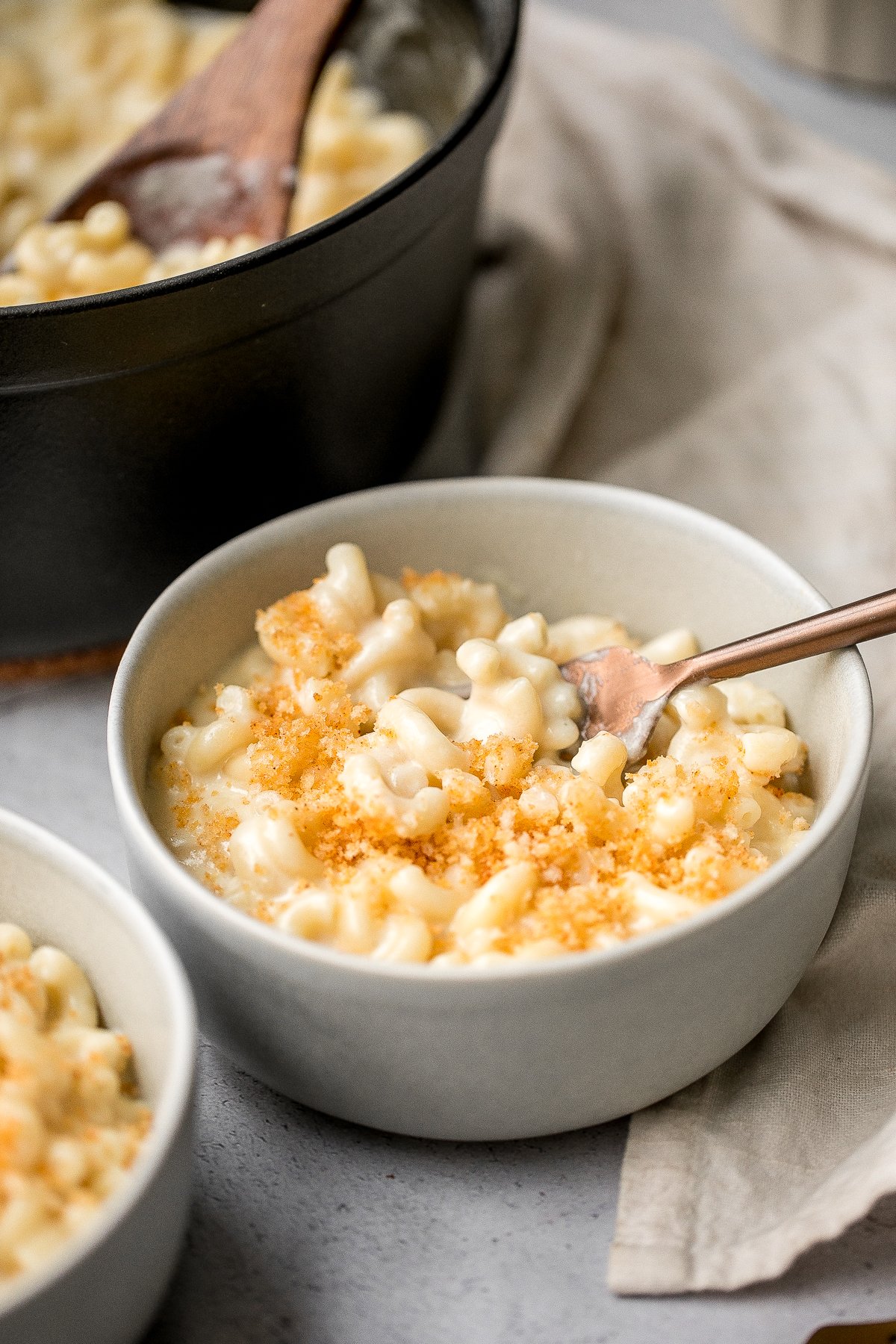 Quick and easy, creamy stovetop mac and cheese with white cheddar is a delicious and comforting one pot 20-minute meal packed with three types of cheese. | aheadofthyme.com