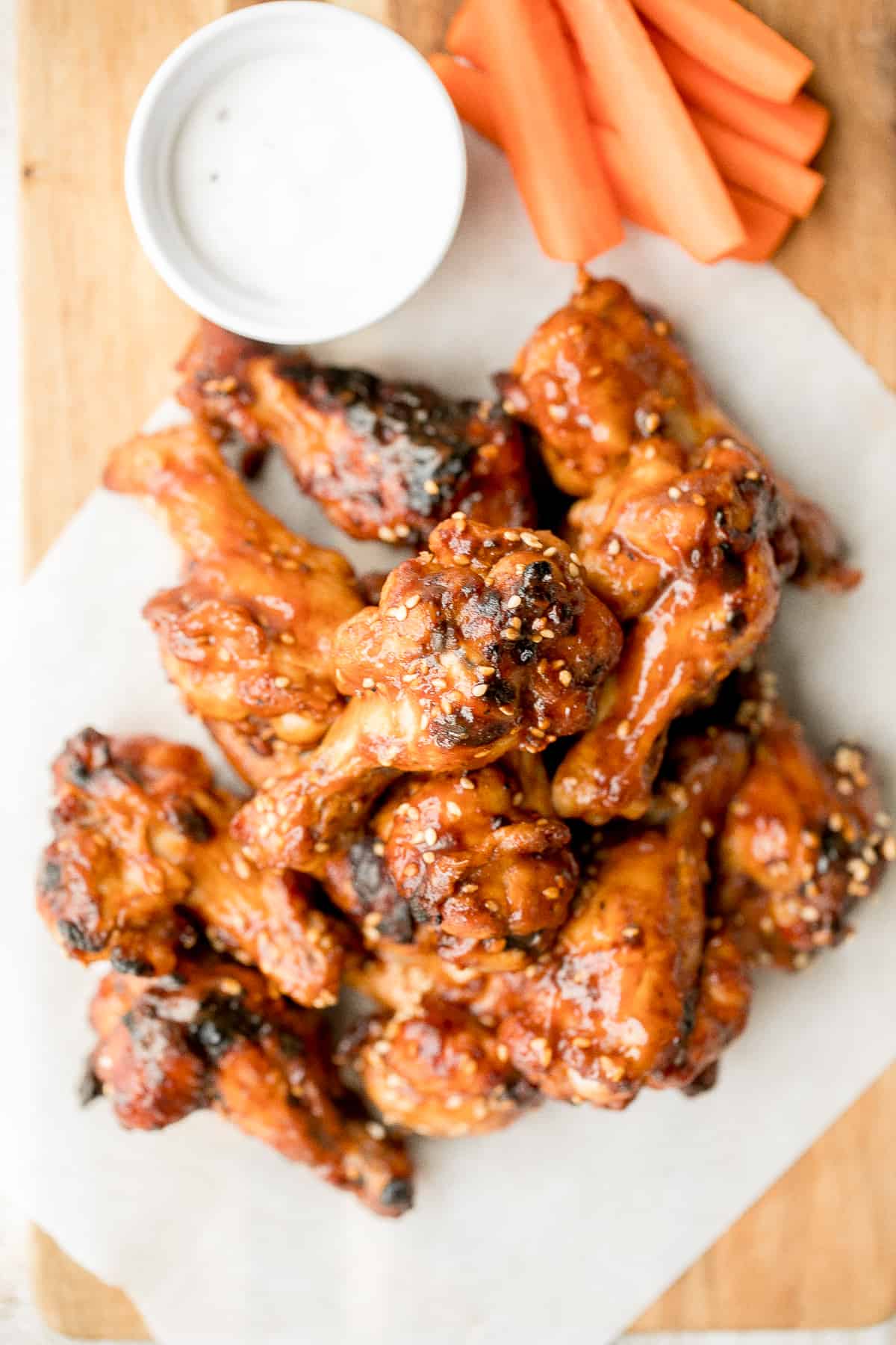 Sweet and sticky, baked BBQ chicken wings are perfectly crispy, so delicious, and smothered in barbecue sauce. They are the perfect game day appetizer. | aheadofthyme.com