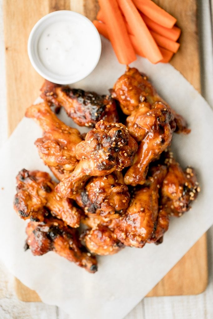 Sweet and sticky, baked BBQ chicken wings are perfectly crispy, so delicious, and smothered in barbecue sauce. They are the perfect game day appetizer. | aheadofthyme.com