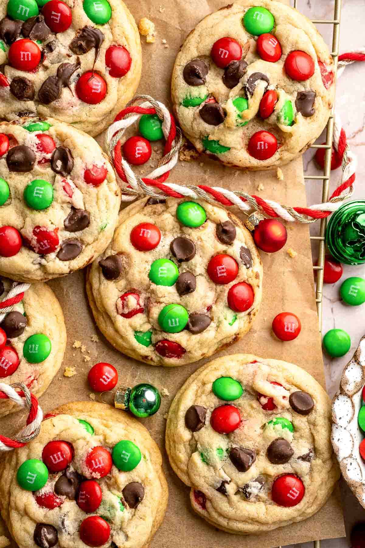 Festive red and green M&M Christmas Cookies that are soft, chewy, and crisp at the edges. Quick and easy, ready in about 20 minutes. | aheadofthyme.com