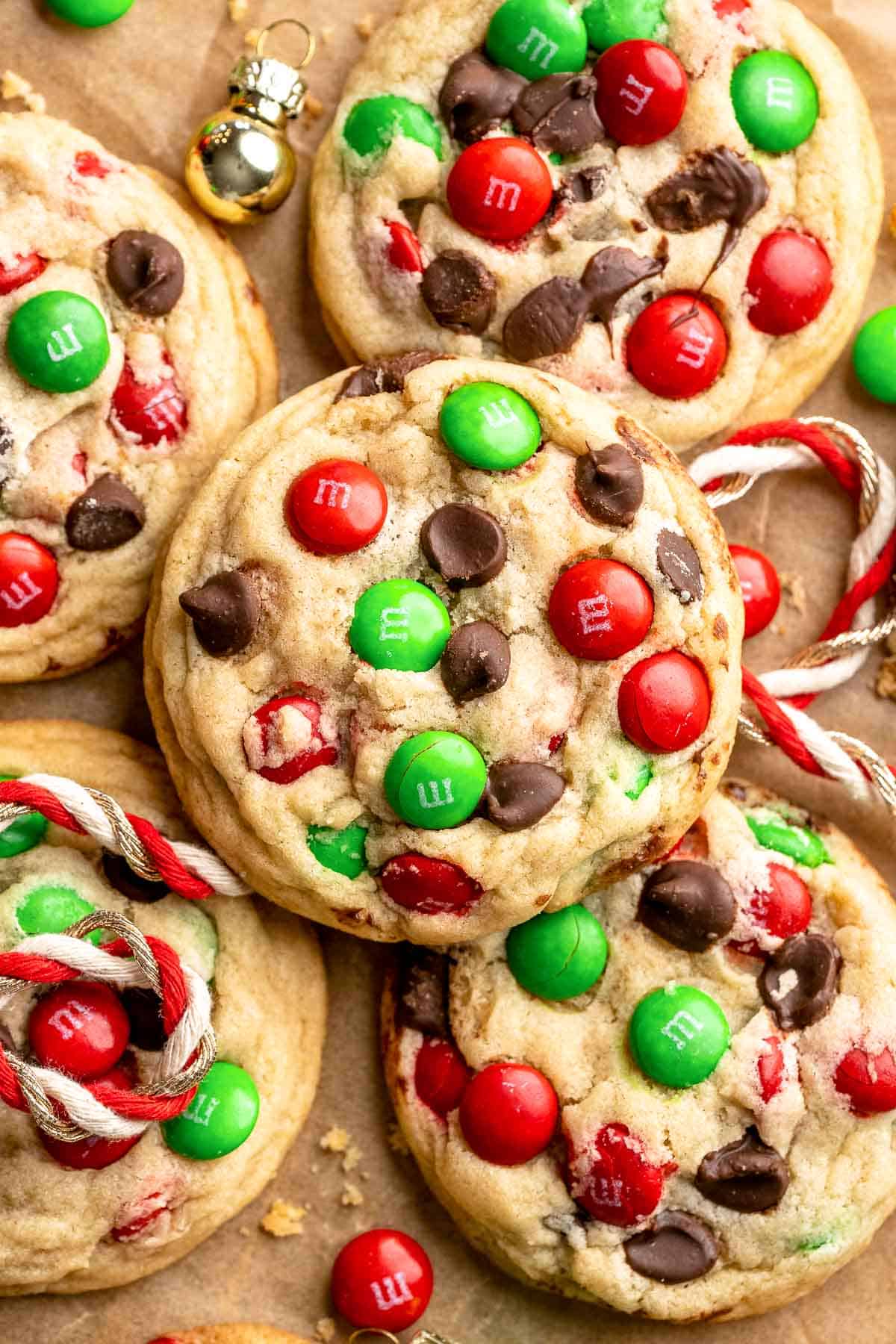 Festive red and green M&M Christmas Cookies that are soft, chewy, and crisp at the edges. Quick and easy, ready in about 20 minutes. | aheadofthyme.com