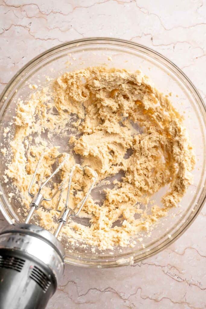 Festive red and green M&M Christmas Cookies that are soft, chewy, and crisp at the edges. Quick and easy, ready in about 20 minutes. | aheadofthyme.com