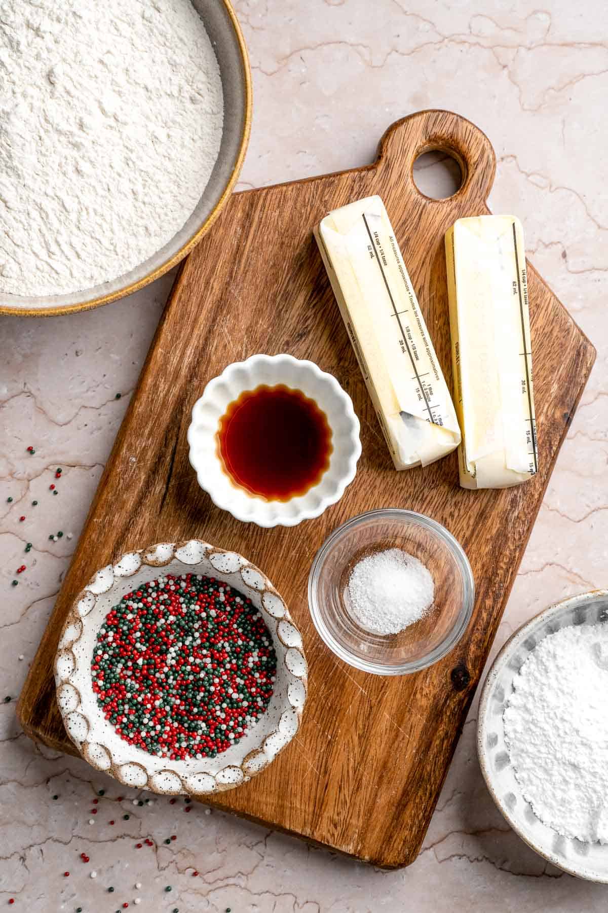 Funfetti Christmas shortbread cookie bites are squares of buttery melt in your mouth mini cookies packed with festive sprinkles for a fun holiday treat. | aheadofthyme.com