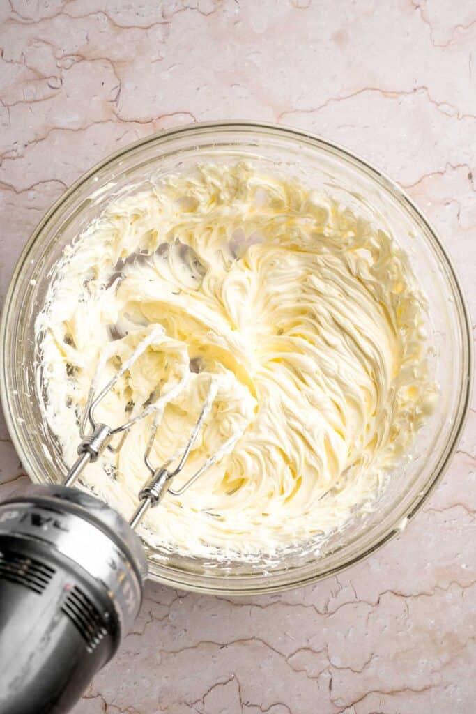 Funfetti Christmas shortbread cookie bites are squares of buttery melt in your mouth mini cookies packed with festive sprinkles for a fun holiday treat. | aheadofthyme.com