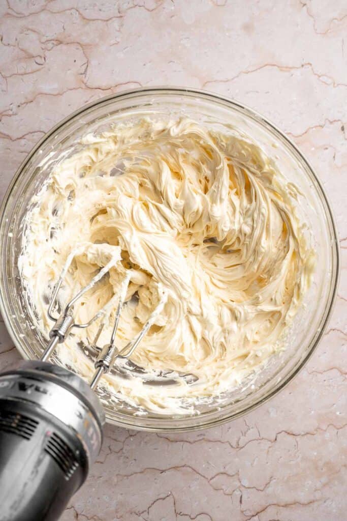 Funfetti Christmas shortbread cookie bites are squares of buttery melt in your mouth mini cookies packed with festive sprinkles for a fun holiday treat. | aheadofthyme.com