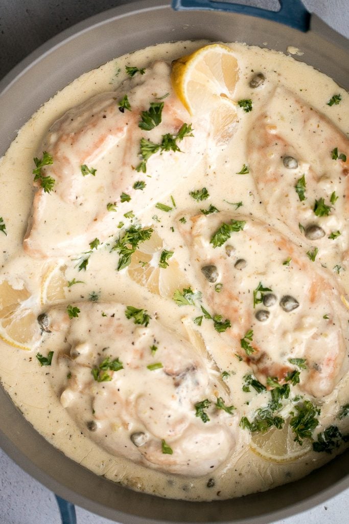 Creamy lemon parmesan chicken is a simple, quick and easy 30-minute meal that is packed with flavour. The most comforting and easiest weeknight dinner. | aheadofthyme.com