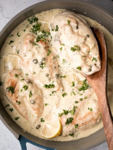 Creamy lemon parmesan chicken is a simple, quick and easy 30-minute meal that is packed with flavour. The most comforting and easiest weeknight dinner. | aheadofthyme.com