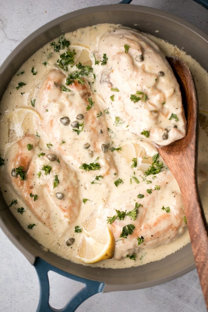 Creamy lemon parmesan chicken is a simple, quick and easy 30-minute meal that is packed with flavour. The most comforting and easiest weeknight dinner. | aheadofthyme.com