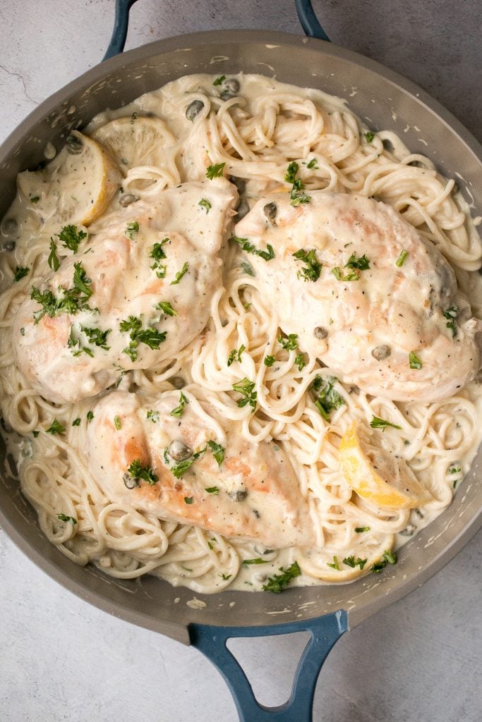 Creamy lemon parmesan chicken is a simple, quick and easy 30-minute meal that is packed with flavour. The most comforting and easiest weeknight dinner. | aheadofthyme.com