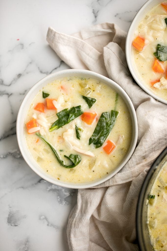 Warm and cozy, creamy turkey orzo soup is wholesome, hearty, filling, and flavourful. Make this delicious one pot meal with leftover turkey in 30 minutes. | aheadofthyme.com