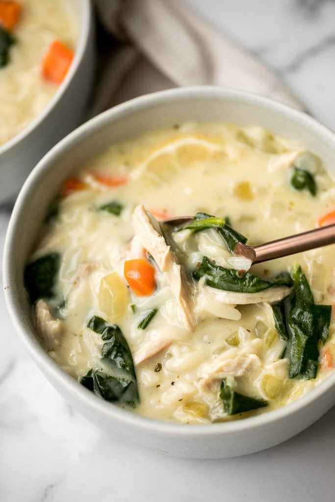 Warm and cozy, creamy turkey orzo soup is wholesome, hearty, filling, and flavourful. Make this delicious one pot meal with leftover turkey in 30 minutes. | aheadofthyme.com