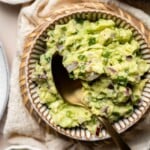 This authentic Guacamole recipe is quick and easy to make at home with just a few simple ingredients and 5 minutes of time. It's fresh and flavorful. | aheadofthyme.com