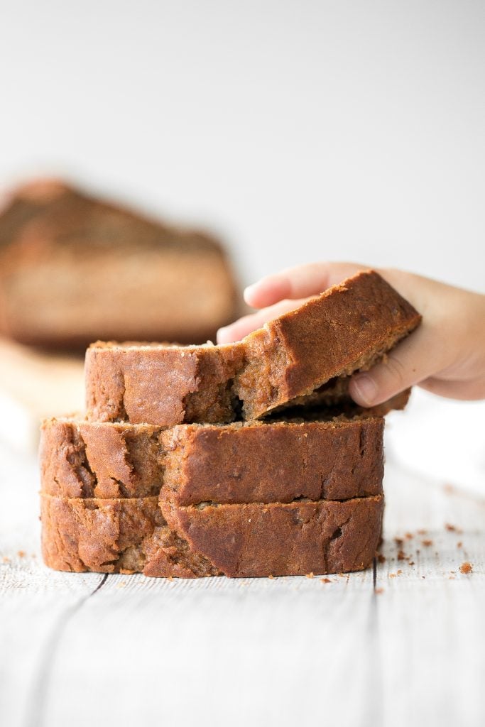 Healthy banana bread is delicious and moist and contains no refined sugar or butter. Quick and easy to make with 10 minutes prep and few pantry staples. | aheadofthyme.com