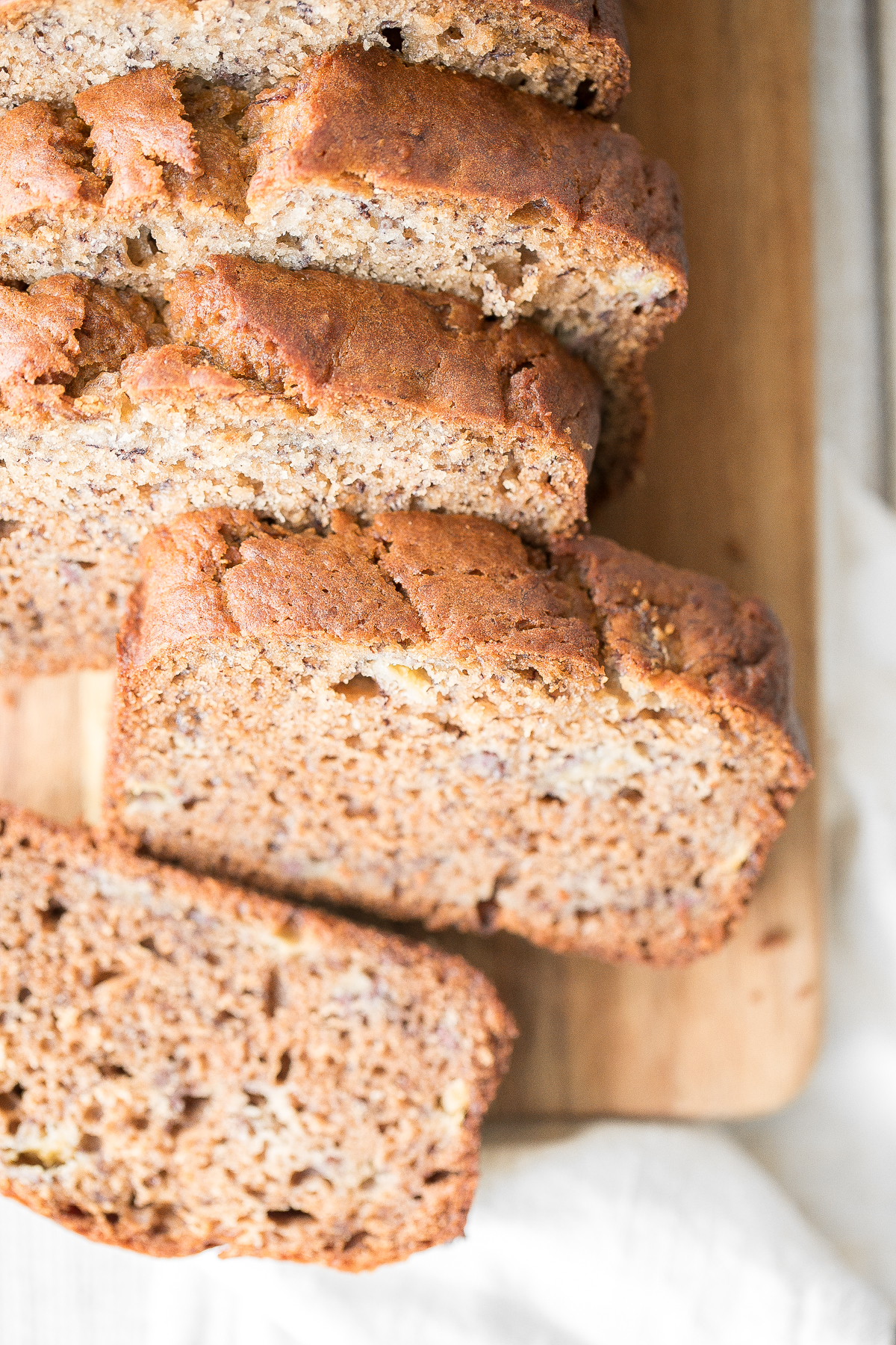 Healthy banana bread is delicious and moist and contains no refined sugar or butter. Quick and easy to make with 10 minutes prep and few pantry staples. | aheadofthyme.com
